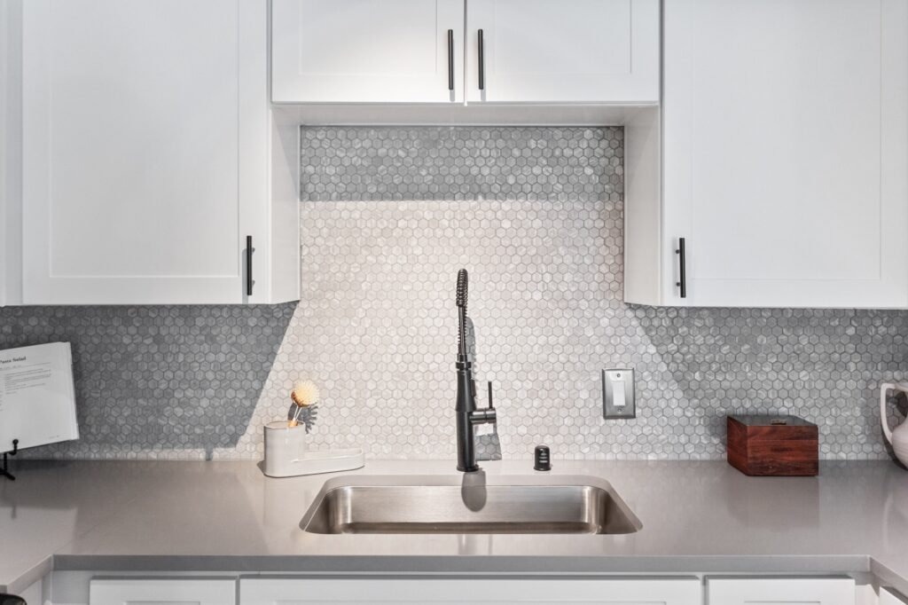Kitchen countertop with sink at Madera Ridge apartment complex in Escondido, CA